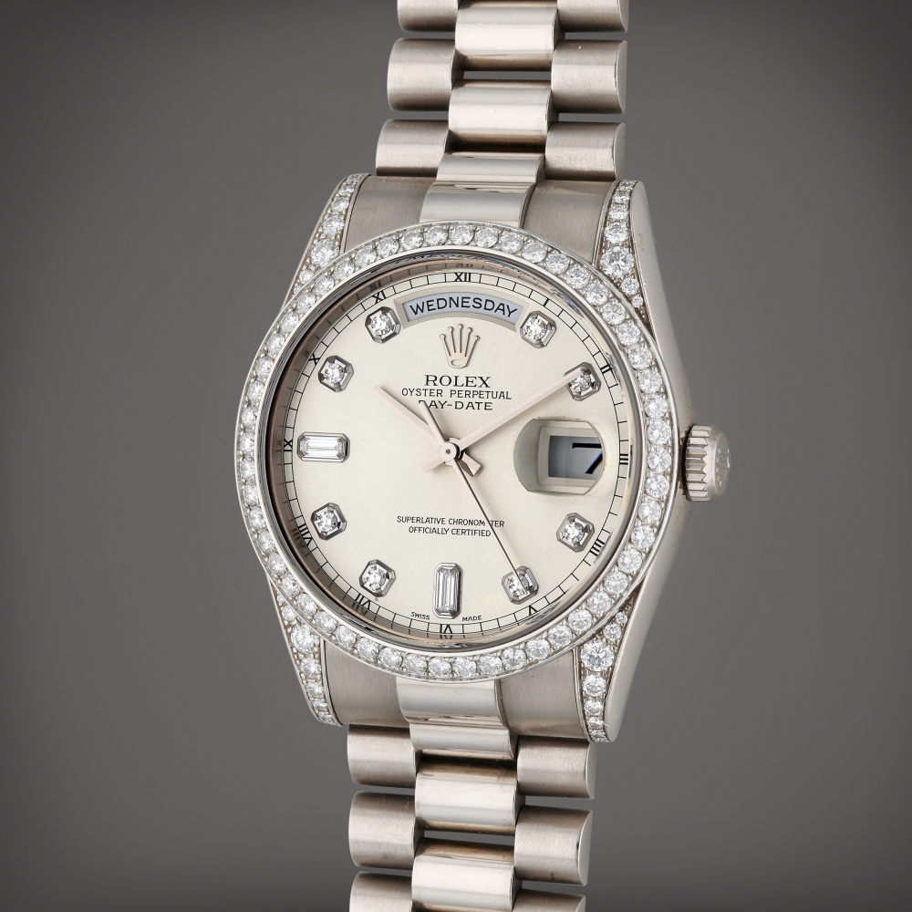 Rolex Reference 118389 Day-Date | A white gold and diamond-set automatic wristwatch with day, date, and bracelet, Circa 2000