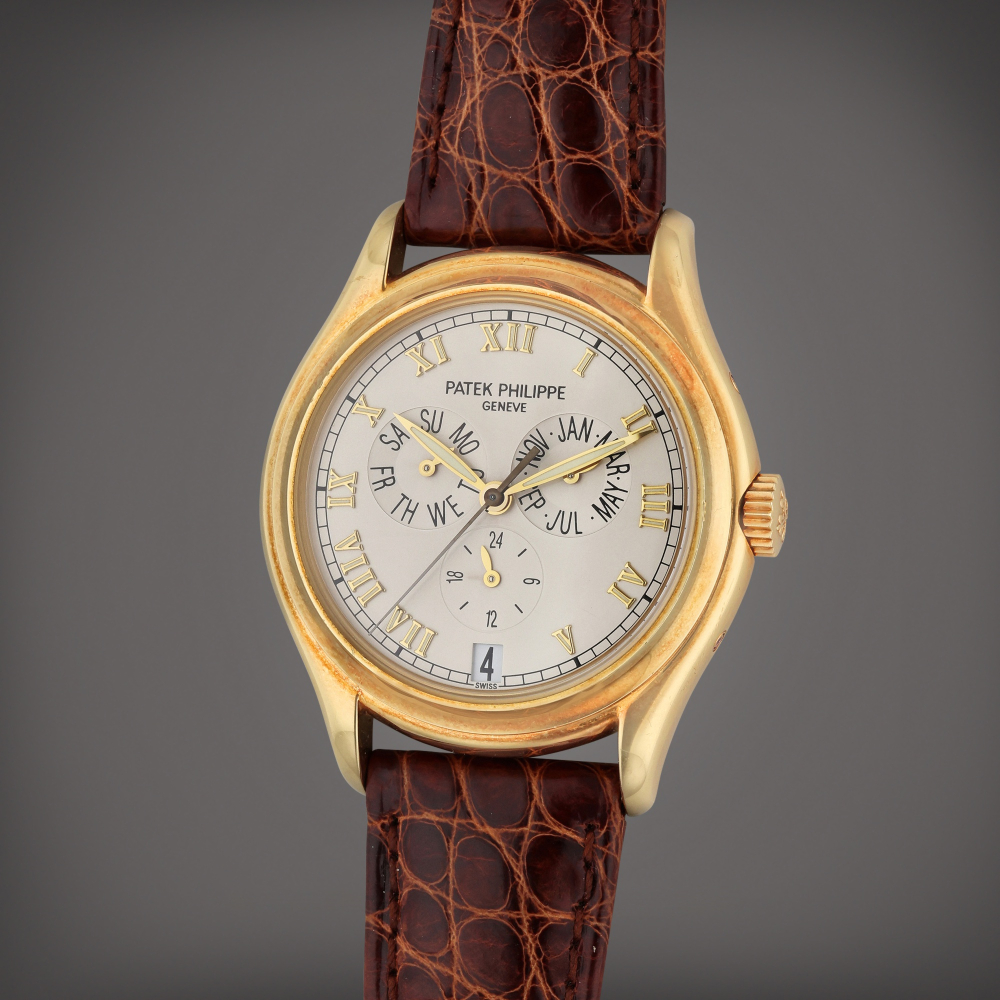 Patek Philippe Reference 5035 | A yellow gold automatic annual calendar wristwatch with 24 hour indication, Made in 1999
