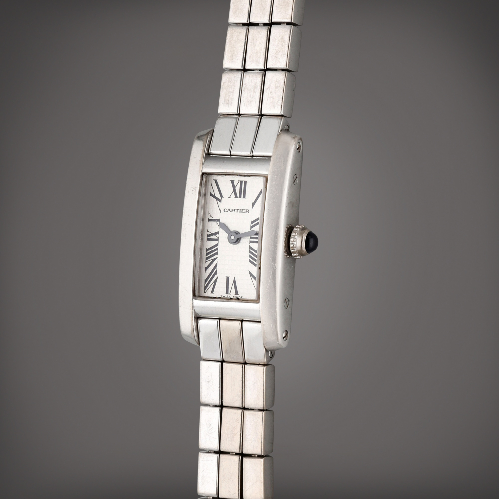Cartier Reference 2544 Tank Americaine | A white gold wristwatch with bracelet, Circa 2000