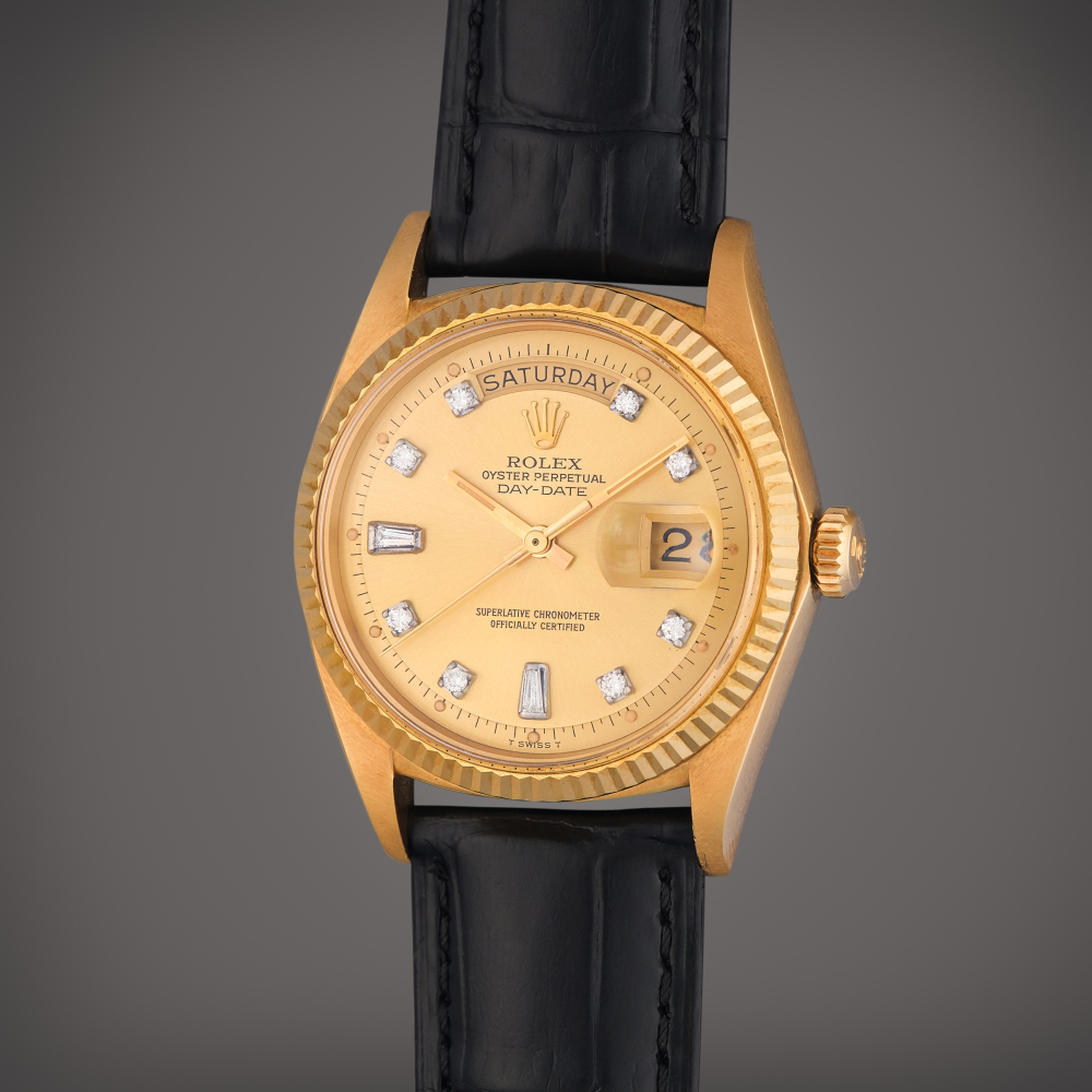 Rolex Reference 1803 Day-Date | A yellow gold and diamond-set automatic wristwatch with day and date, Circa 1971