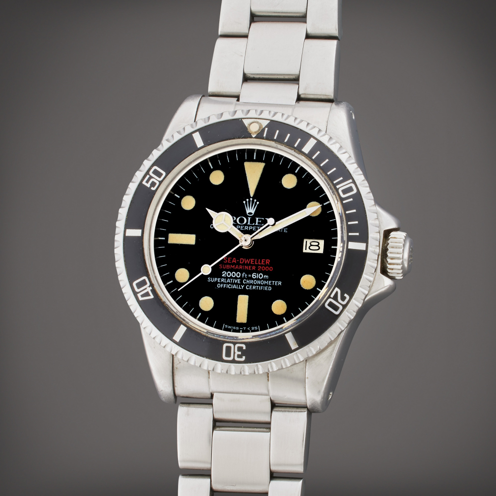 Rolex Reference 1665 Sea-Dweller ‘Double Red’ | A stainless steel automatic wristwatch with date and bracelet, Circa 1978