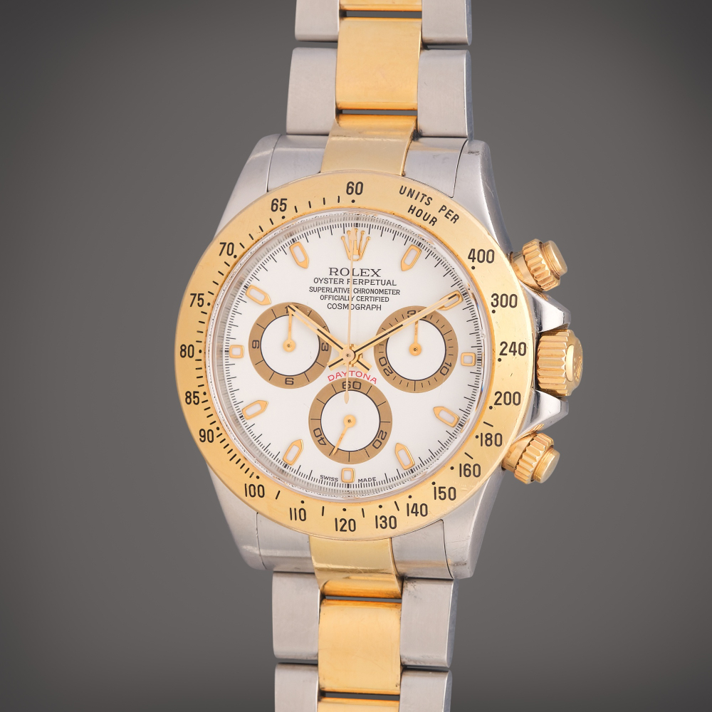 Rolex Reference 116523 Daytona | A stainless steel and yellow gold automatic chronograph wristwatch with bracelet, Circa 2004
