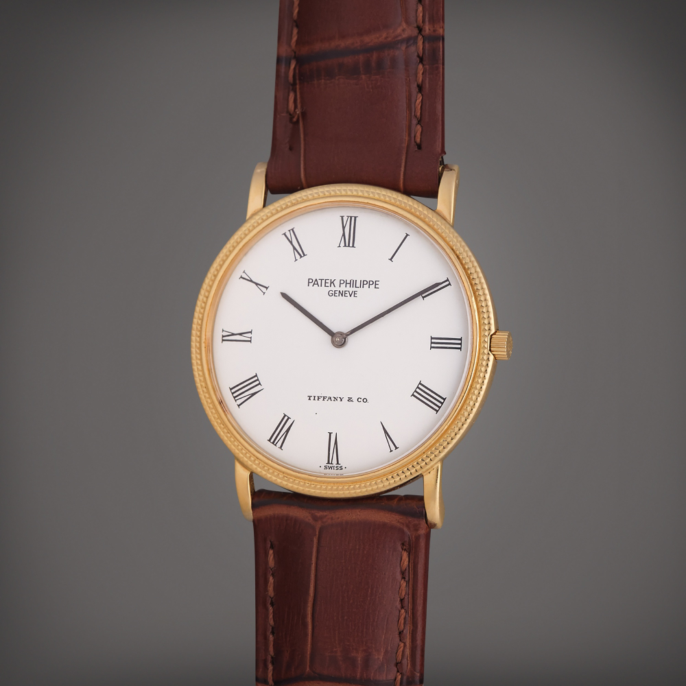 Patek Philippe Reference 3520/D Calatrava | Retailed by Tiffany Co.: A yellow gold wristwatch, Made in 1986
