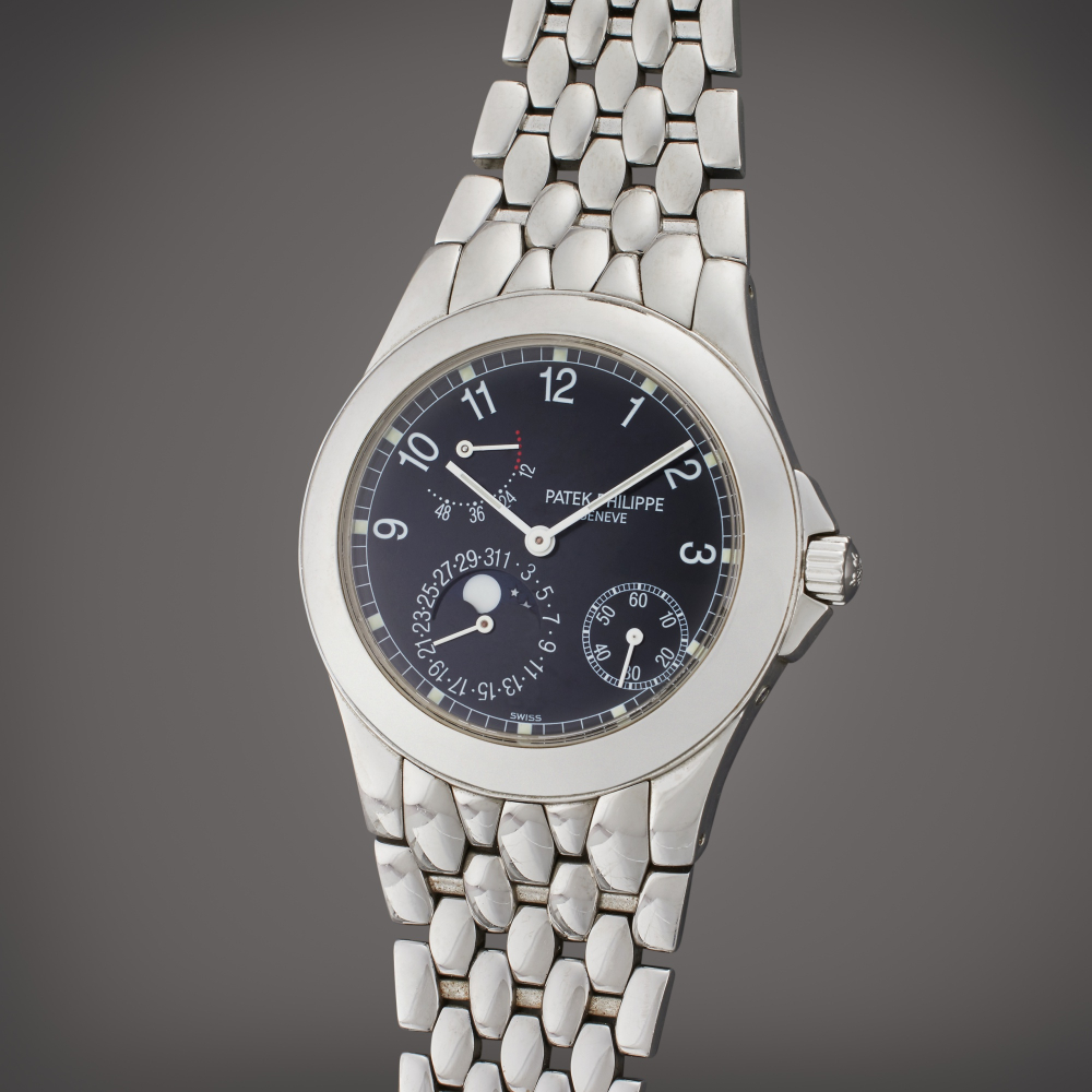 Patek Philippe Reference 5085/1A-001 ‘Neptune’ | A stainless steel automatic bracelet watch with date, moon phases, and power reserve indication, Circa 2007