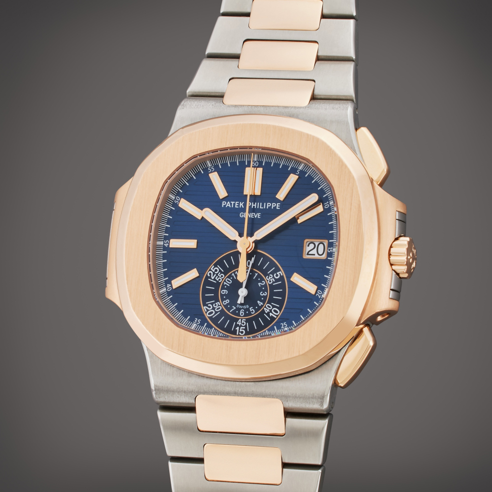 Patek Philippe Reference 5980/AR-001 Nautilus | A stainless steel and pink gold automatic flyback chronograph wristwatch with date and bracelet, Circa 2014