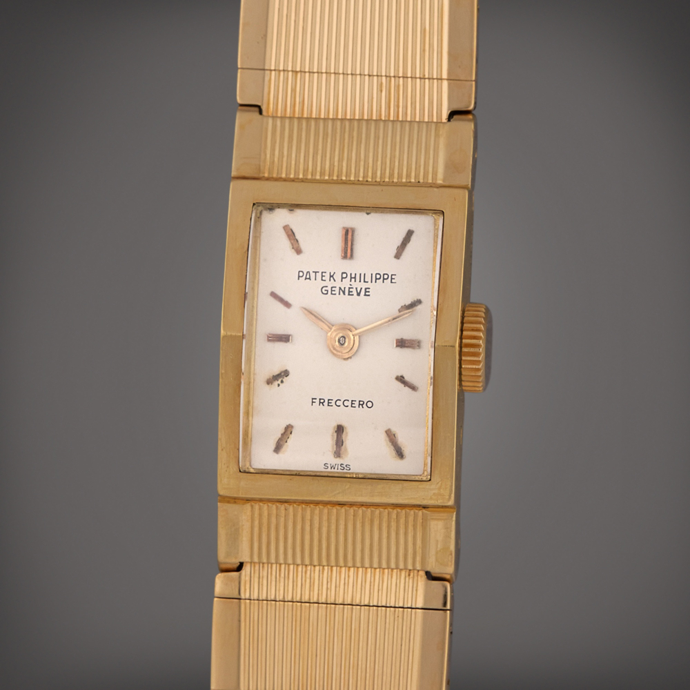 Patek Philippe Reference 3250 | Retailed by Freccero: A yellow gold wristwatch with bracelet, Circa 1955