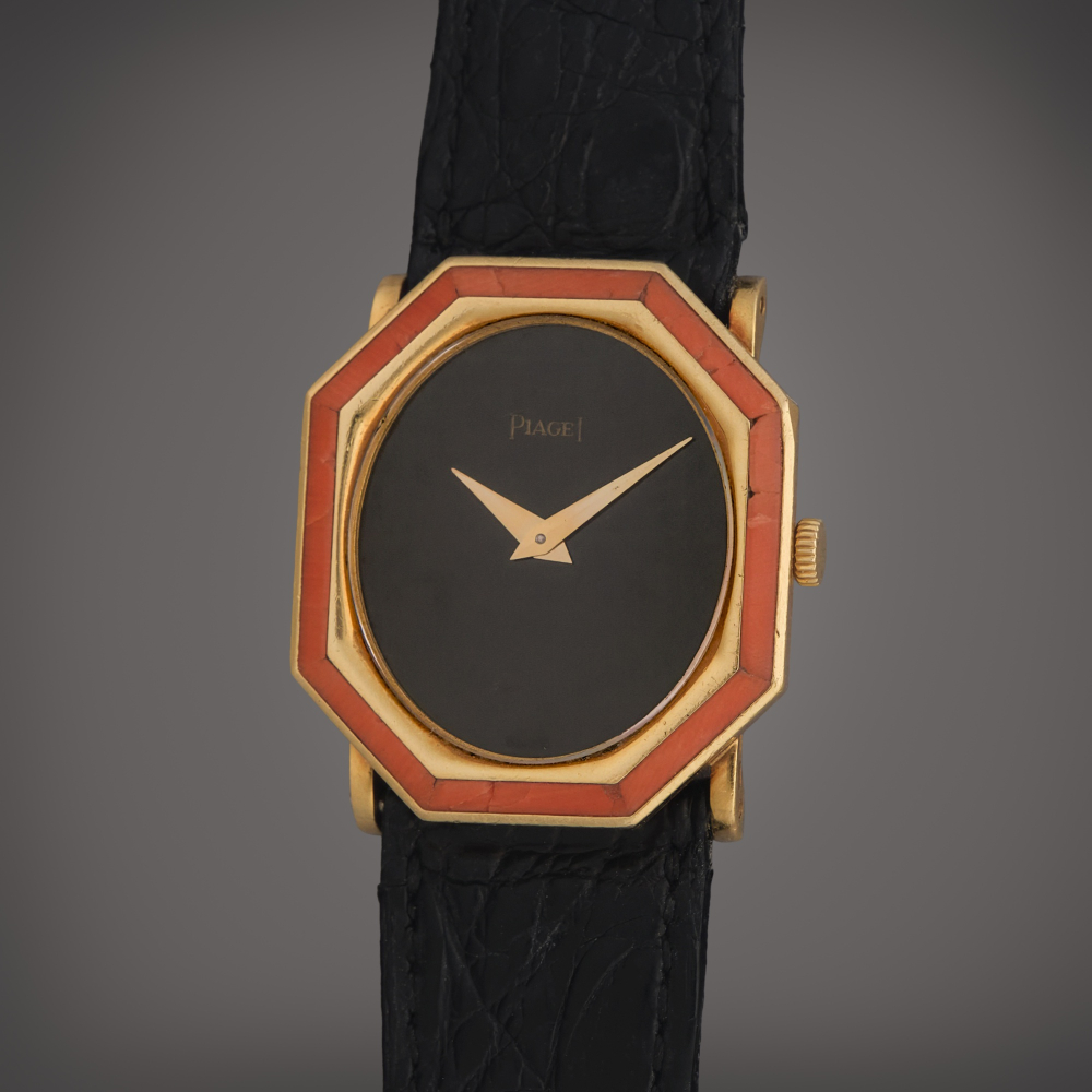 Piaget Reference 9341 | A yellow gold and coral wristwatch with onyx dial, Circa 1980
