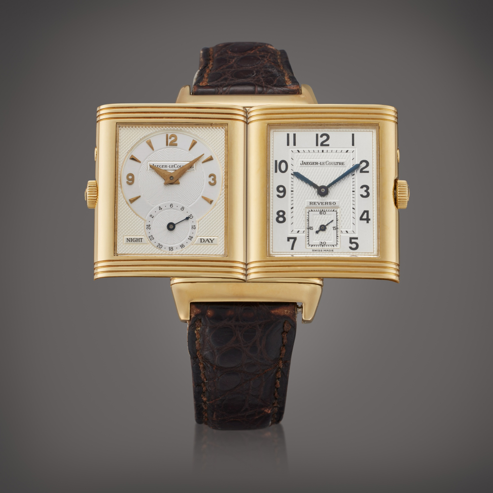 Jaeger-LeCoultre Reference 270.154 Reverso Duoface | A yellow gold rectangular dual time wristwatch with day/night indication, Circa 2000