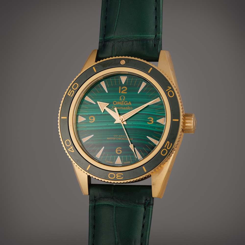 Omega Reference 234.63.41.21.99.001 Seamaster 300 | A yellow gold automatic wristwatch with malachite dial, Circa 2019