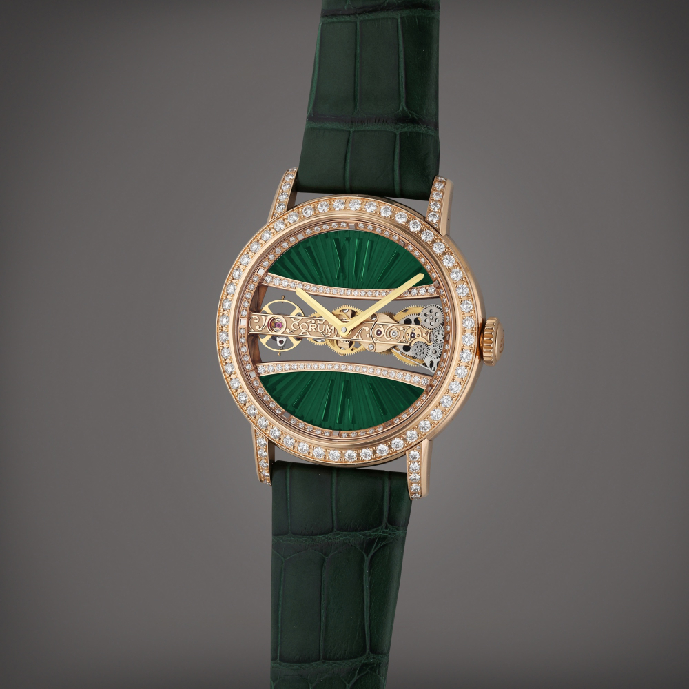 Corum Reference 05.0089 Golden Bridge | A pink gold and diamond-set skeletonized wristwatch, Circa 2018
