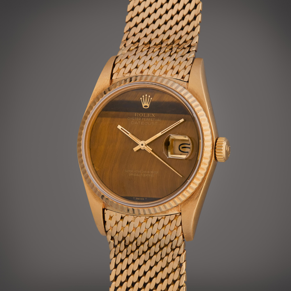 Rolex Reference 16018 Datejust | A yellow gold automatic wristwatch with date, mesh bracelet, and tiger's eye dial, Circa 1984