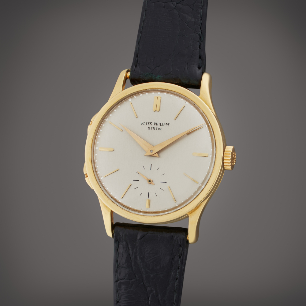 Patek Philippe Reference 2597 'Heures Sautantes' | A yellow gold wristwatch with adjustable jumping hour hand, Made in 1960