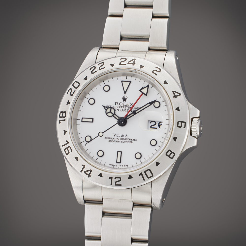 Rolex Reference 16570 Explorer II | Retailed by Van Cleef Arpels: A stainless steel automatic dual time wristwatch with date and bracelet, Circa 1995