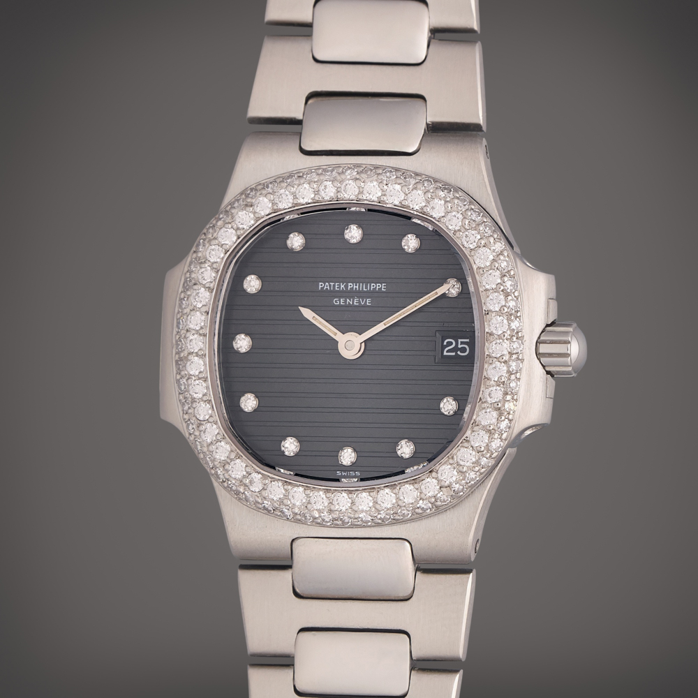 Patek Philippe Reference 4700/4 Nautilus | A platinum and diamond-set wristwatch with date and bracelet, Circa 1985