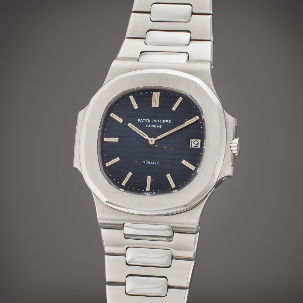 Patek Philippe Reference 3700/001 Nautilus | Retailed by Gübelin: A stainless steel automatic wristwatch with date and bracelet, Circa 1980