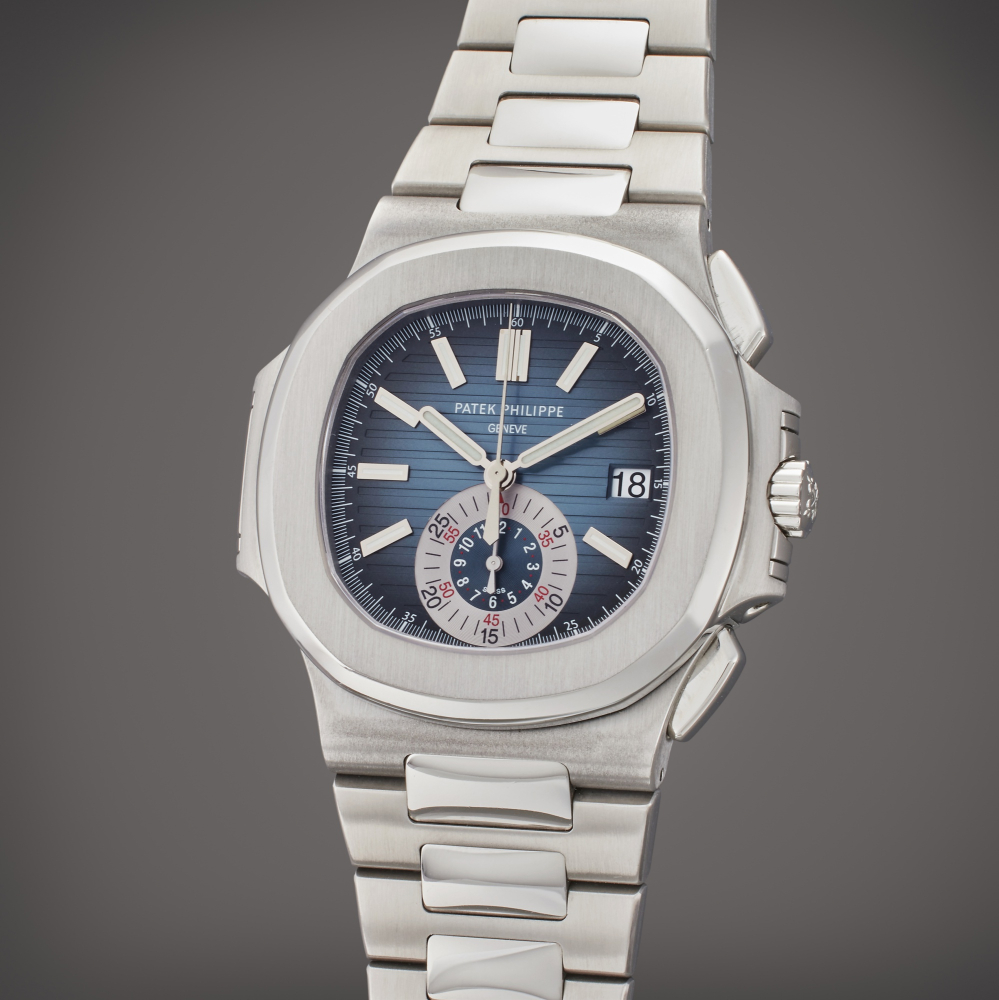 Patek Philippe Reference 5980/1A-001 Nautilus | A stainless steel flyback chronograph bracelet watch with date, Circa 2010