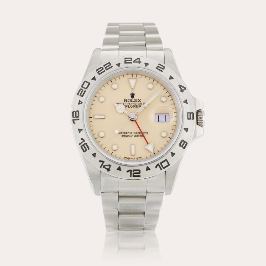 Rolex Reference 16550 Explorer II | A stainless steel automatic dual time wristwatch with cream dial, date and bracelet, Circa 1987