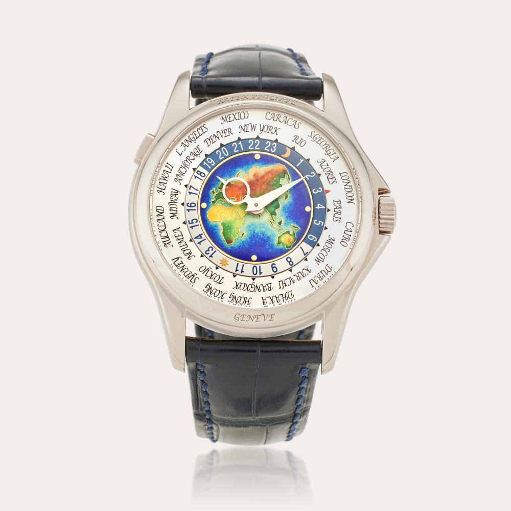 Patek Philippe Reference 5131G-001 | Retailed by Tiffany Co.: A white gold world time wristwatch with cloisonné enamel dial, Circa 2011