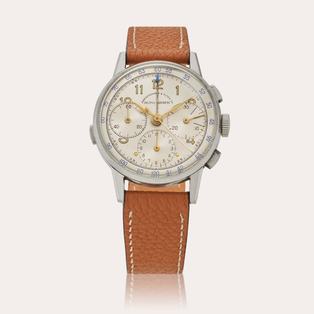 PROPERTY FROM THE COLLECTION OF JEFF STEIN Heuer Auto-Graph | Retailed by Abercrombie Fitch Co.: A stainless steel chronograph wristwatch, Circa 1953