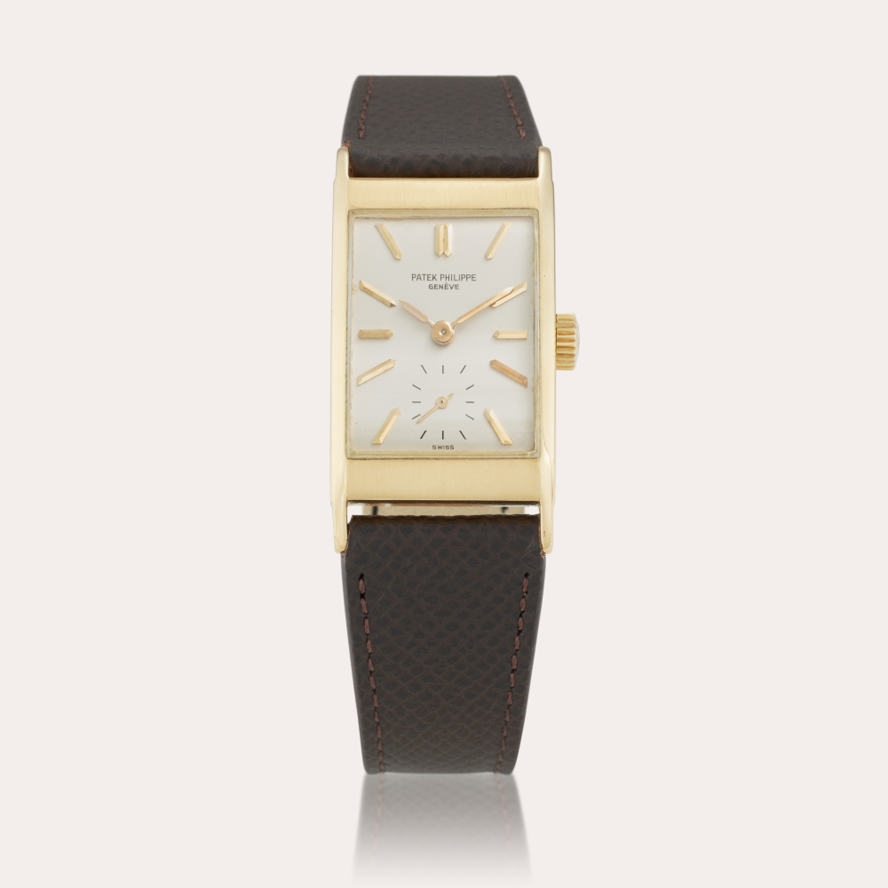 Patek Philippe Reference 2461 ‘Tegola’ | A yellow gold rectangular wristwatch, Circa 1952