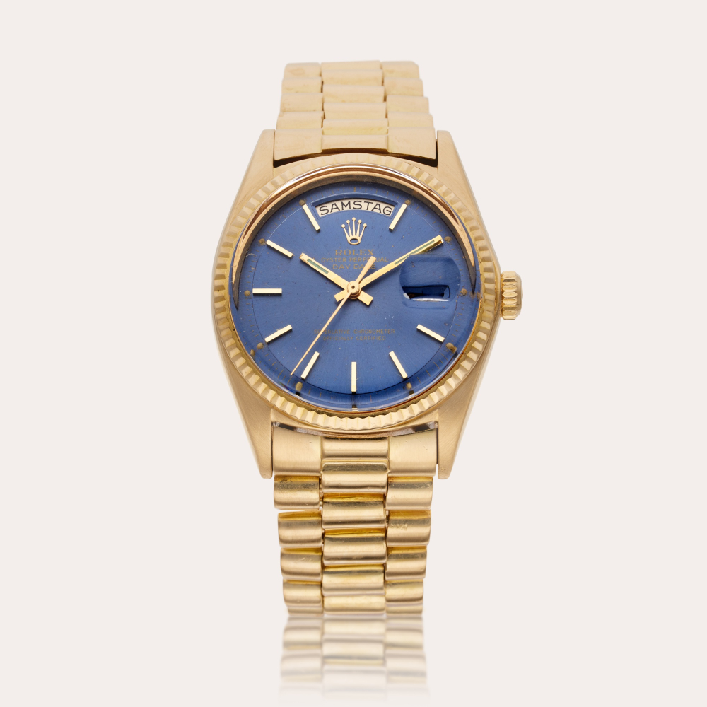 Rolex Reference 1803 Day-Date | A yellow gold automatic wristwatch with day, date, and bracelet, Circa 1970