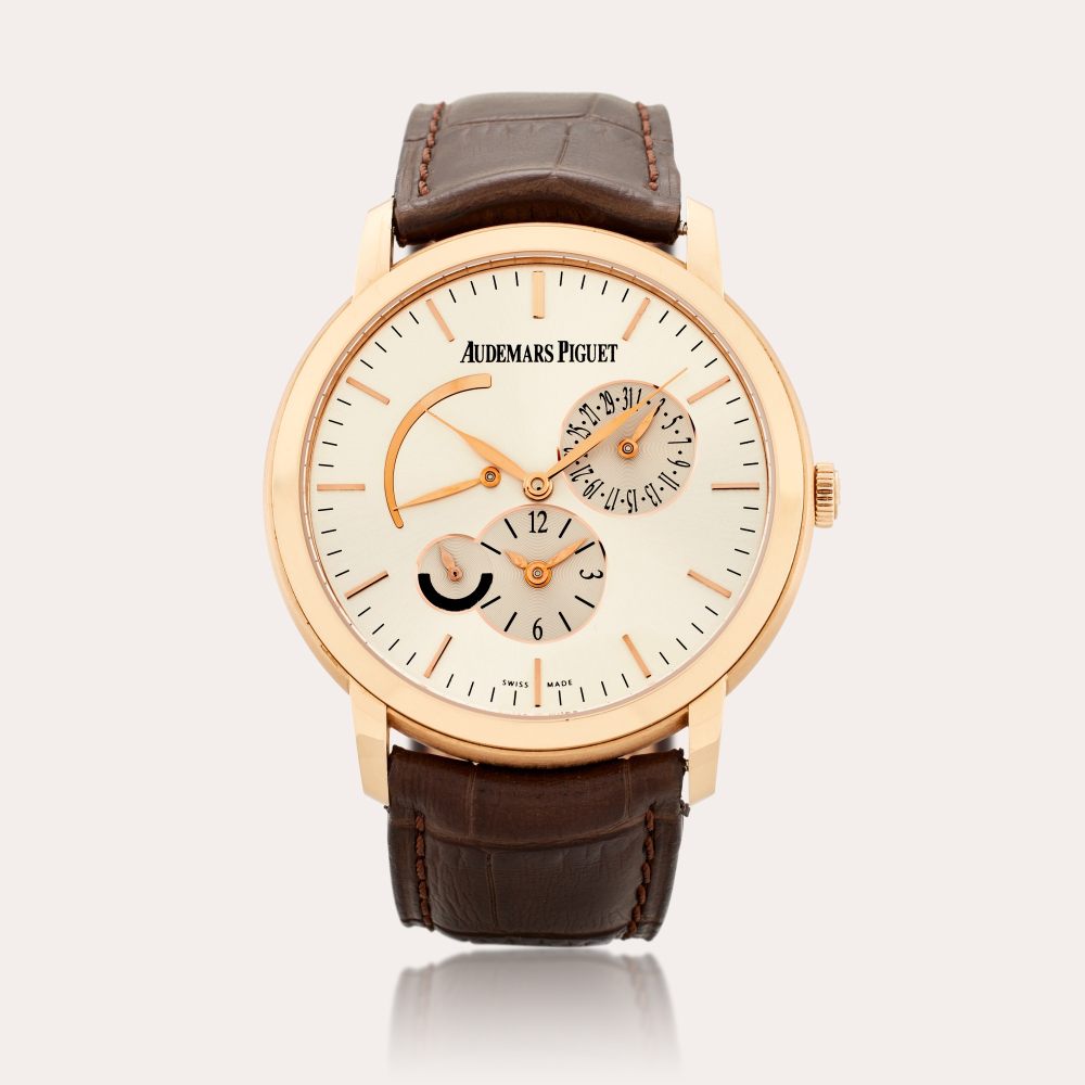 Audemars Piguet Reference 26380OR.OO.D088CR.01 Jules Audemars | A pink gold automatic dual time wristwatch with date, day/night, and power reserve indication, Circa 2015