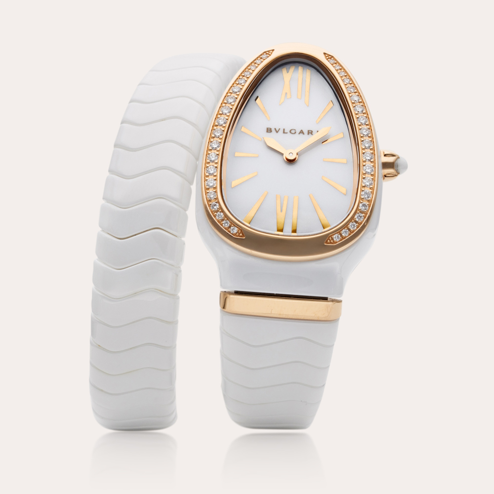 Bulgari Reference SP C 35 W G Serpenti | A white ceramic, pink gold, and diamond-set expandable bracelet watch, Circa 2020