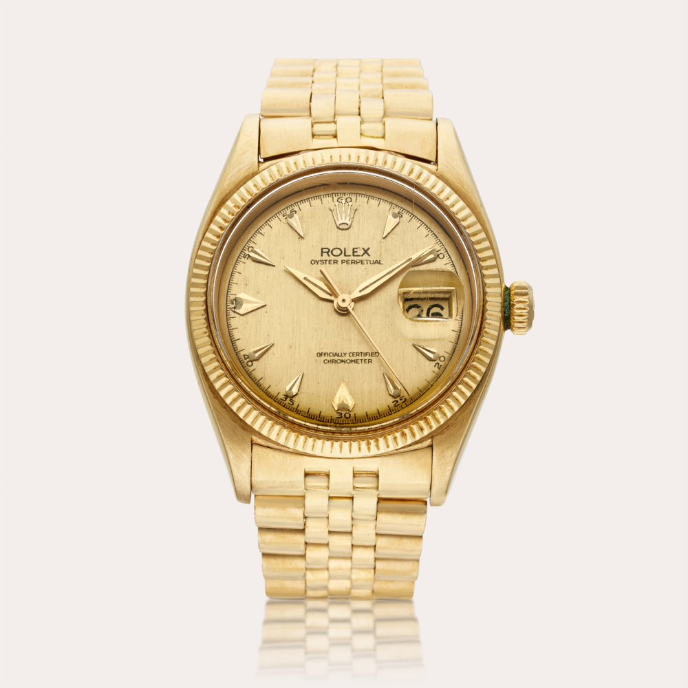 Rolex Reference 6605 Oyster Perpetual | A yellow gold automatic wristwatch with date and bracelet, Circa 1959