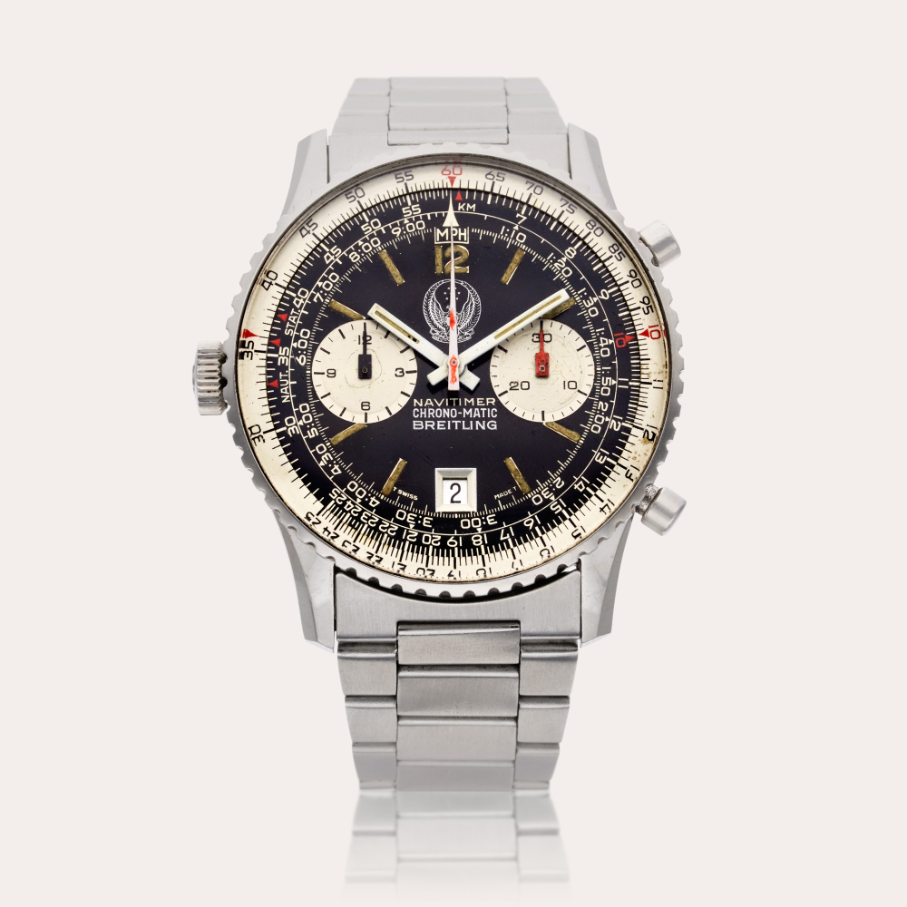 Breitling Reference 8806 Navitimer Chrono-Matic | A stainless steel automatic chronograph wristwatch with date, bracelet, and UAE Armed Forces Coat of Arms, Circa 1975