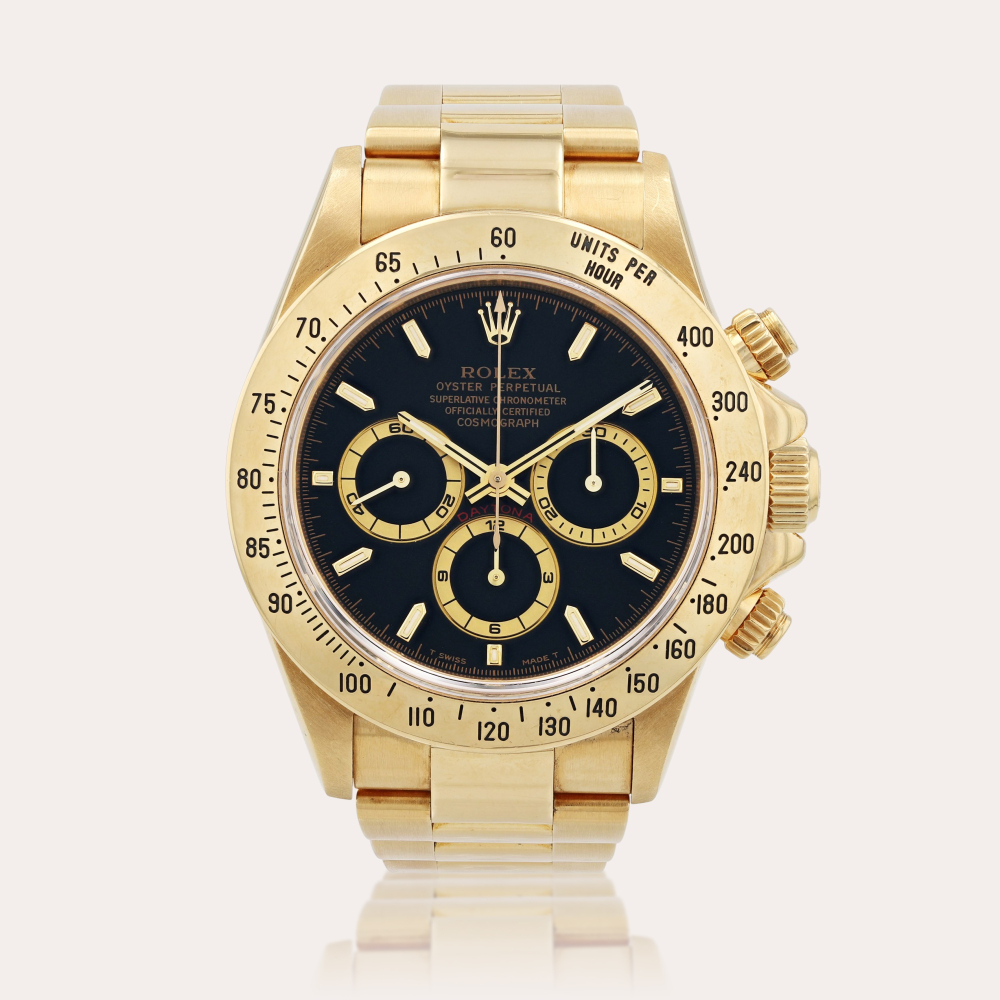 RolexDaytona, reference 16528 Montre bracelet chronographe en or jaune | Yellow gold chronograph wristwatch with bracelet Vers 1997 | Circa 1997
