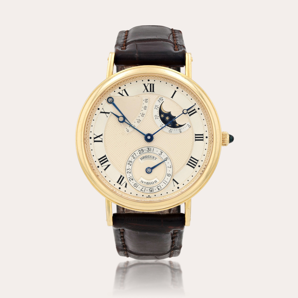 BreguetClassique, reference 3130 Montre bracelet en or jaune avec date, indicateur de réserve de marche et phases de lune | Yellow gold wristwatch with date, power reserve indication and moon phases Vers 1993 | Circa 1993