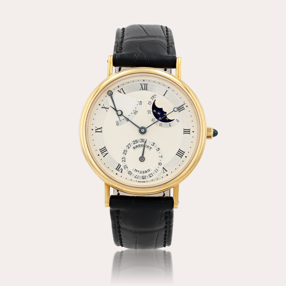 BreguetClassique, reference 3130 Montre bracelet en or jaune avec date, indicateur de réserve de marche et phases de lune | Yellow gold wristwatch with date, power reserve indication and moon phases Vers 2004 | Circa 2004