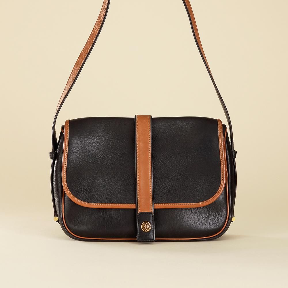 HERMÈS PARIS ANNÉE 1984 Nouméa handbag in black and gold Chamonix leather