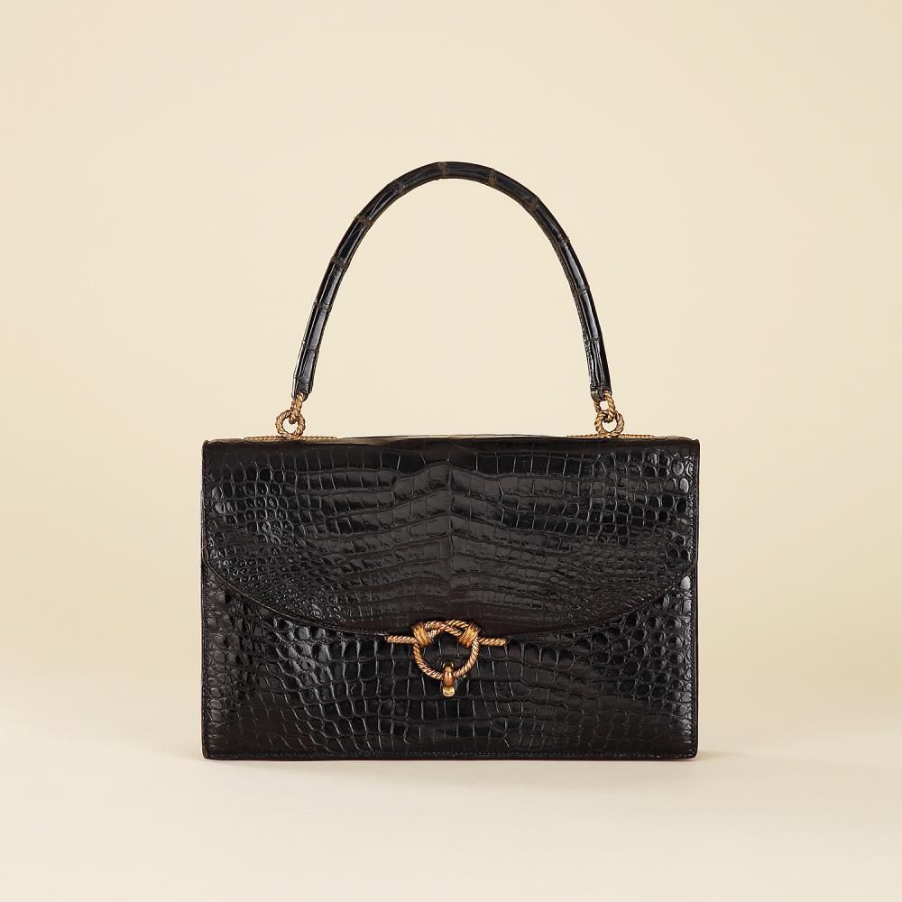 HERMÈS PARIS circa 1960 Cordelière handbag in black crocodile Hardware in gilt metalHandle in black crocodile Lining in black leath...