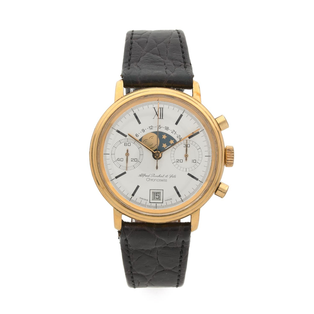 CHRONOSWISS CHRONOGRAPHE PHASES DE LUNE. ALFRED ROCHAT FILS. ANNEES 80 Montre bracelet en plaqué or jaune sur cuir. BOITIER: rond...