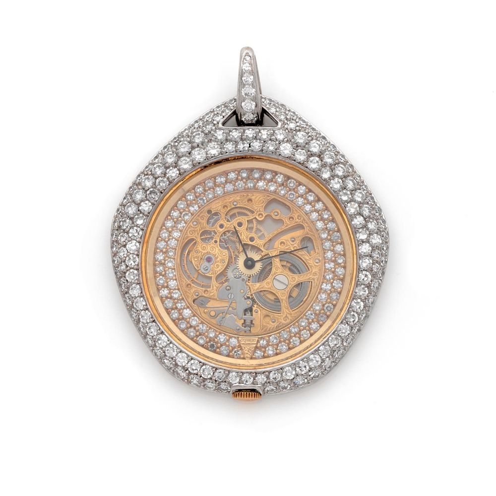DELANEAU pour CHAUMET TRAVAIL MODERNE A yellow, white gold and diamond manual winding skeleton pendant watch by Delaneau for Chaumet...
